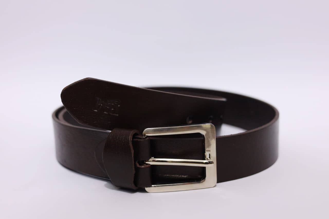 Brown leather belt with a silver buckle on a white background